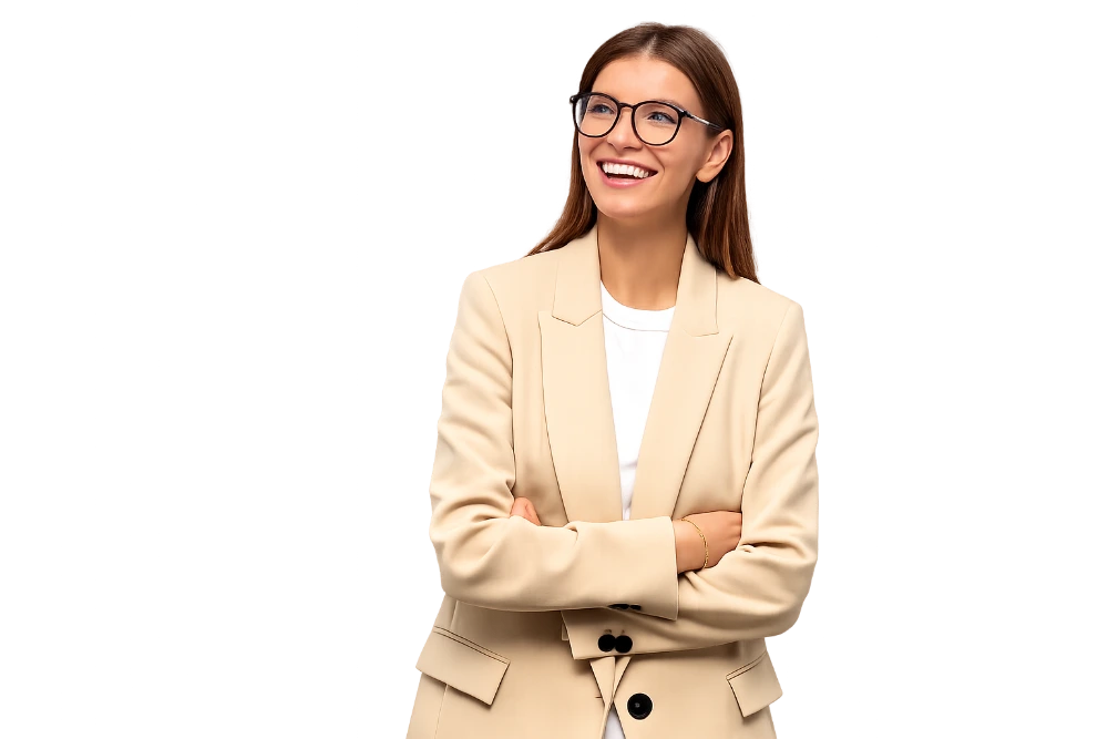 A smiling teacher with her arms crossed.